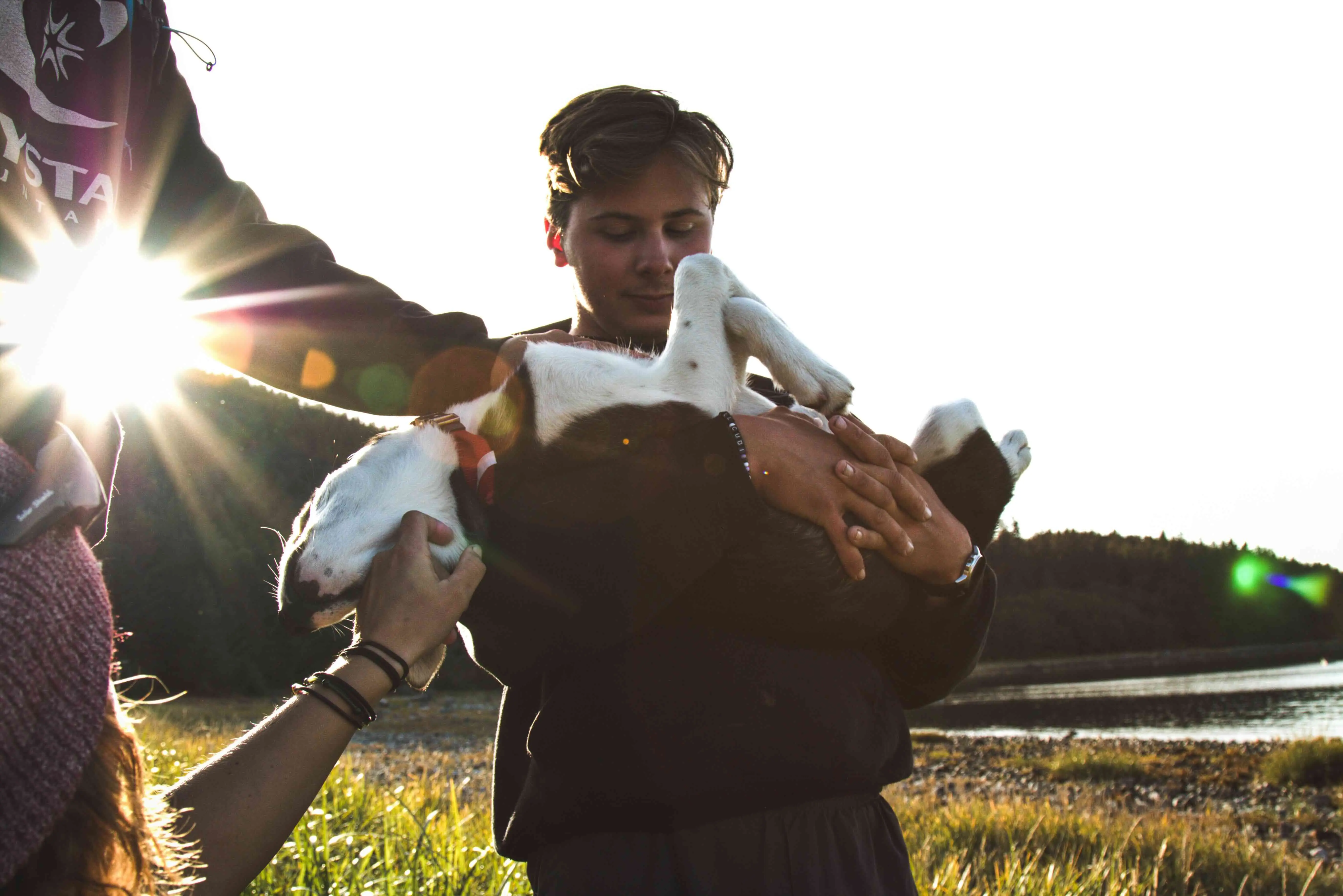 Sam holding his dog in Burlington